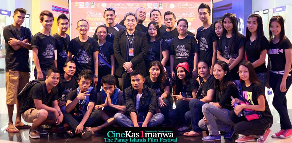 The Guimbal iFilm Society (filmmakers from Guimbal Iloilo) with CineKasimanwa Festival Director Elvert Bañares during the closing ceremonies of the 1st CineKasimanwa: The Western Visayas Film Festival 2013 at SM Cinema 1, SM City Iloilo. Photo from CineKasimanwa: Western Visayas Film Festival page.